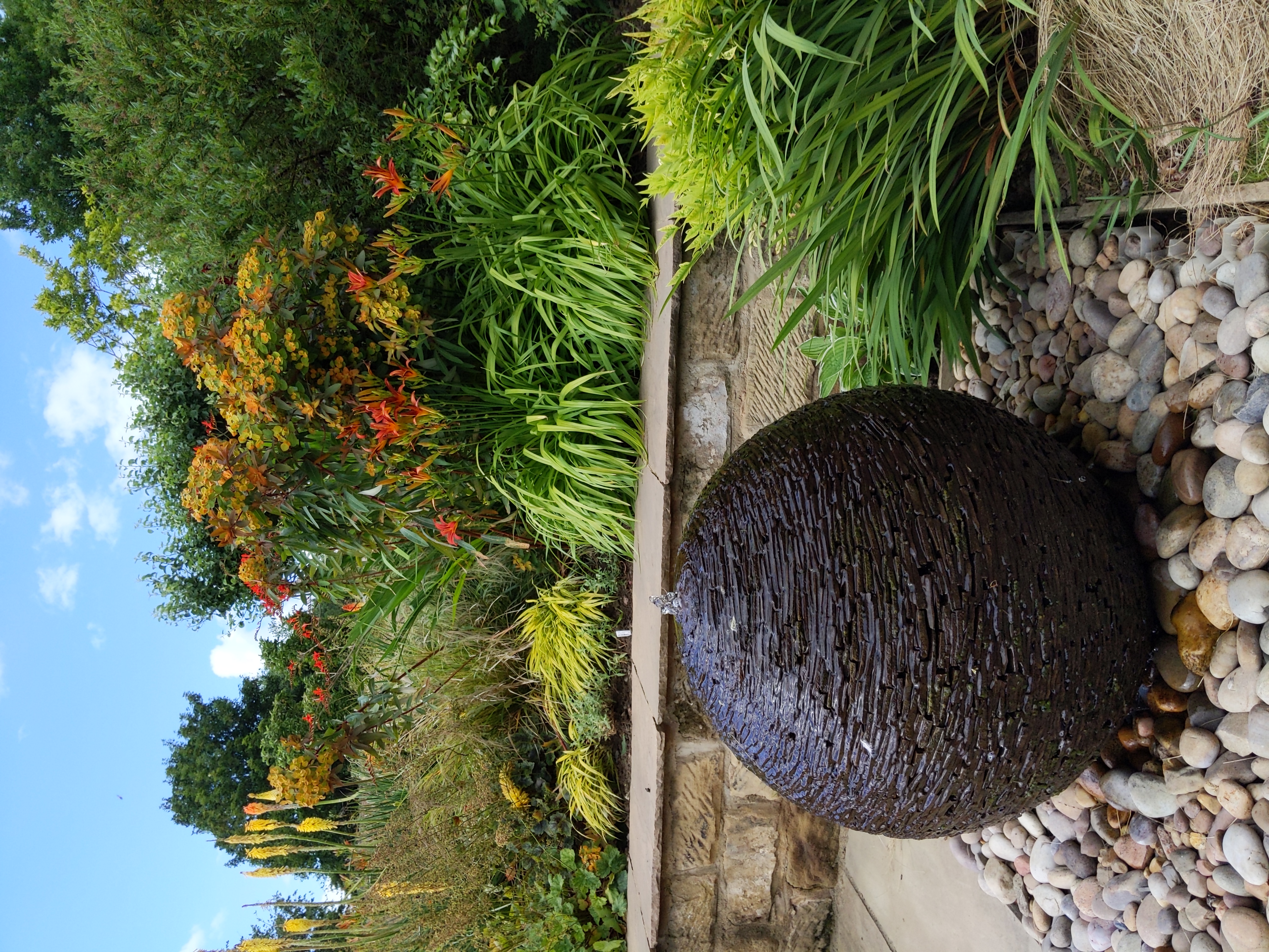 sphere water feature with planting